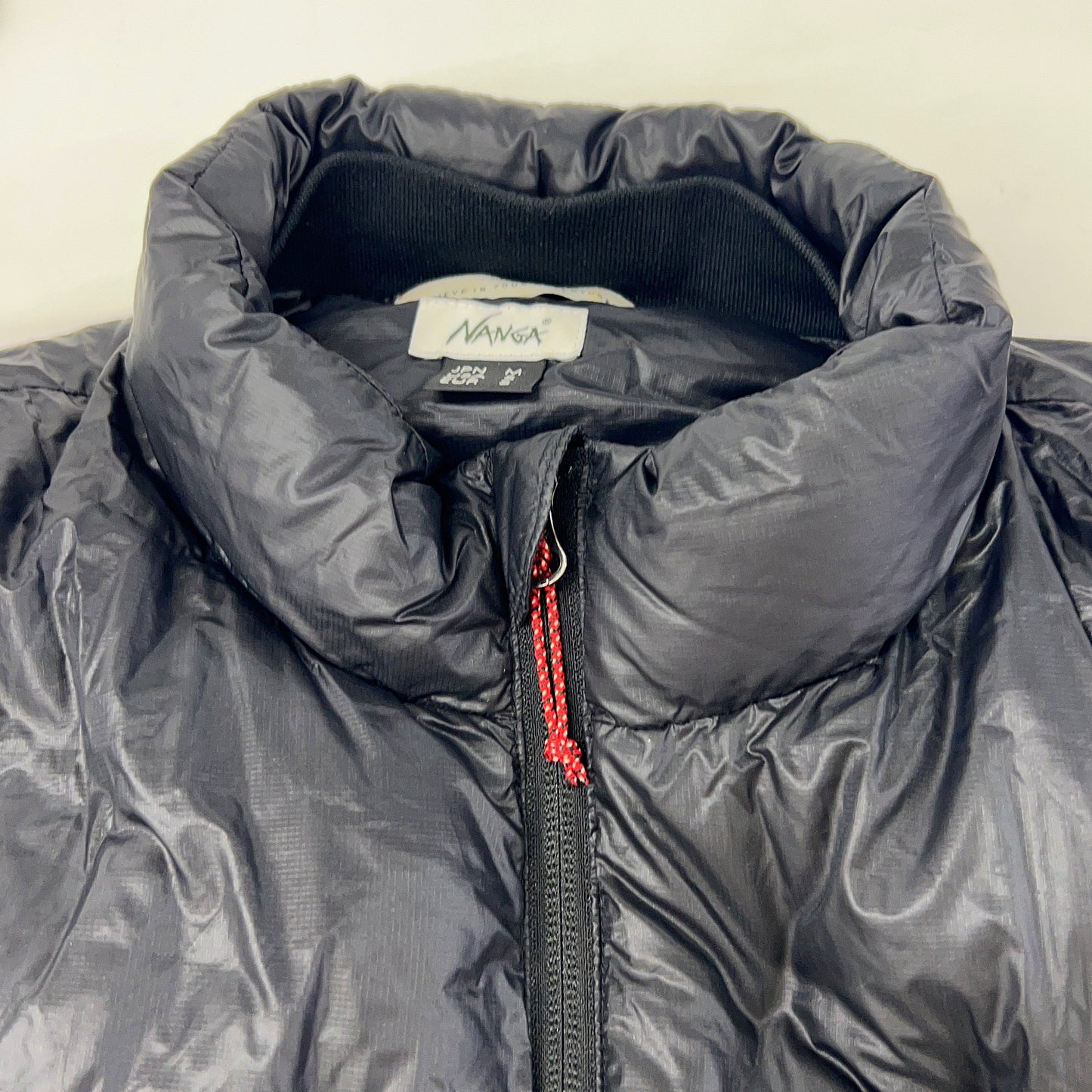 NANGA MOUNTAIN LODGE black lightweight down jacket