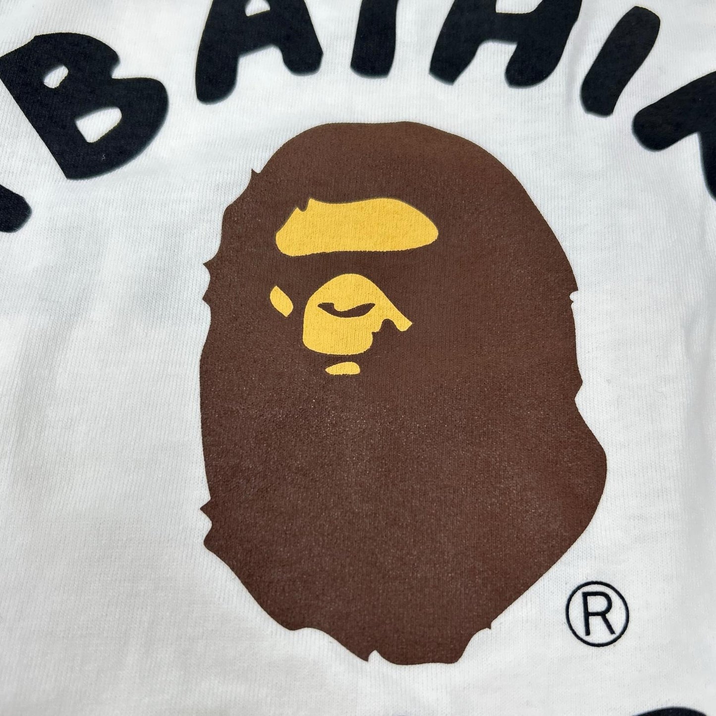 A BATHING APE アベイシングエイプ ホワイト キースヘリング COLLEGE Tシャツ トップス