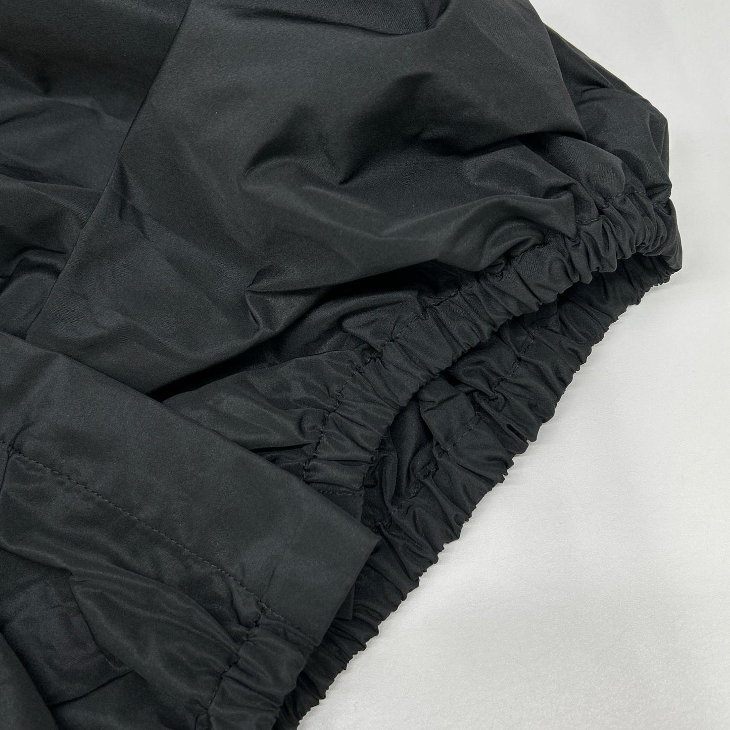 PATOU black recycled faille bubble blouse top
