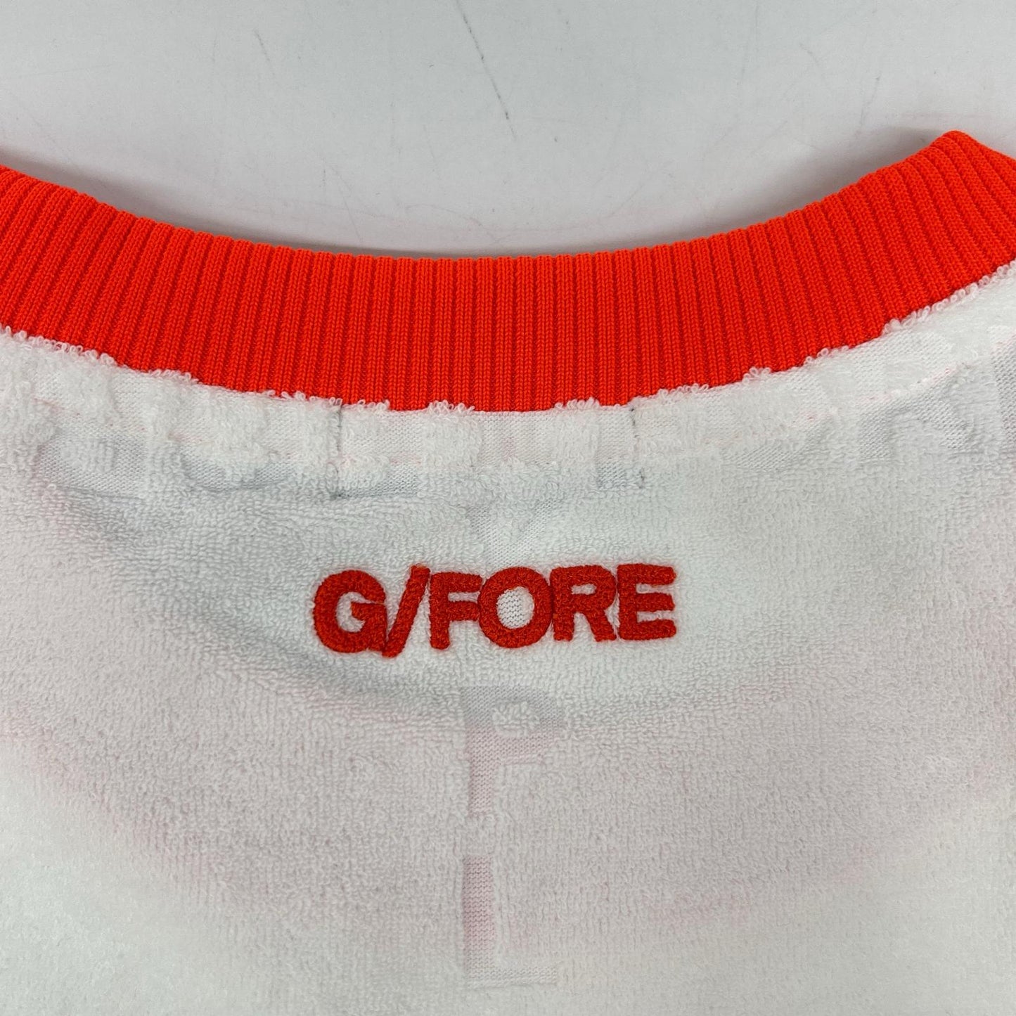G/FORE ジーフォア GNTCM24353 テリースリーブレス オレンジ トップス