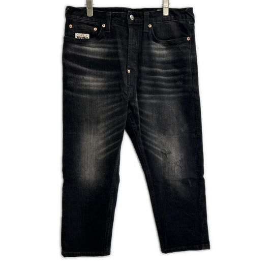 EVISU black multipocket multi-paint cropped jeans