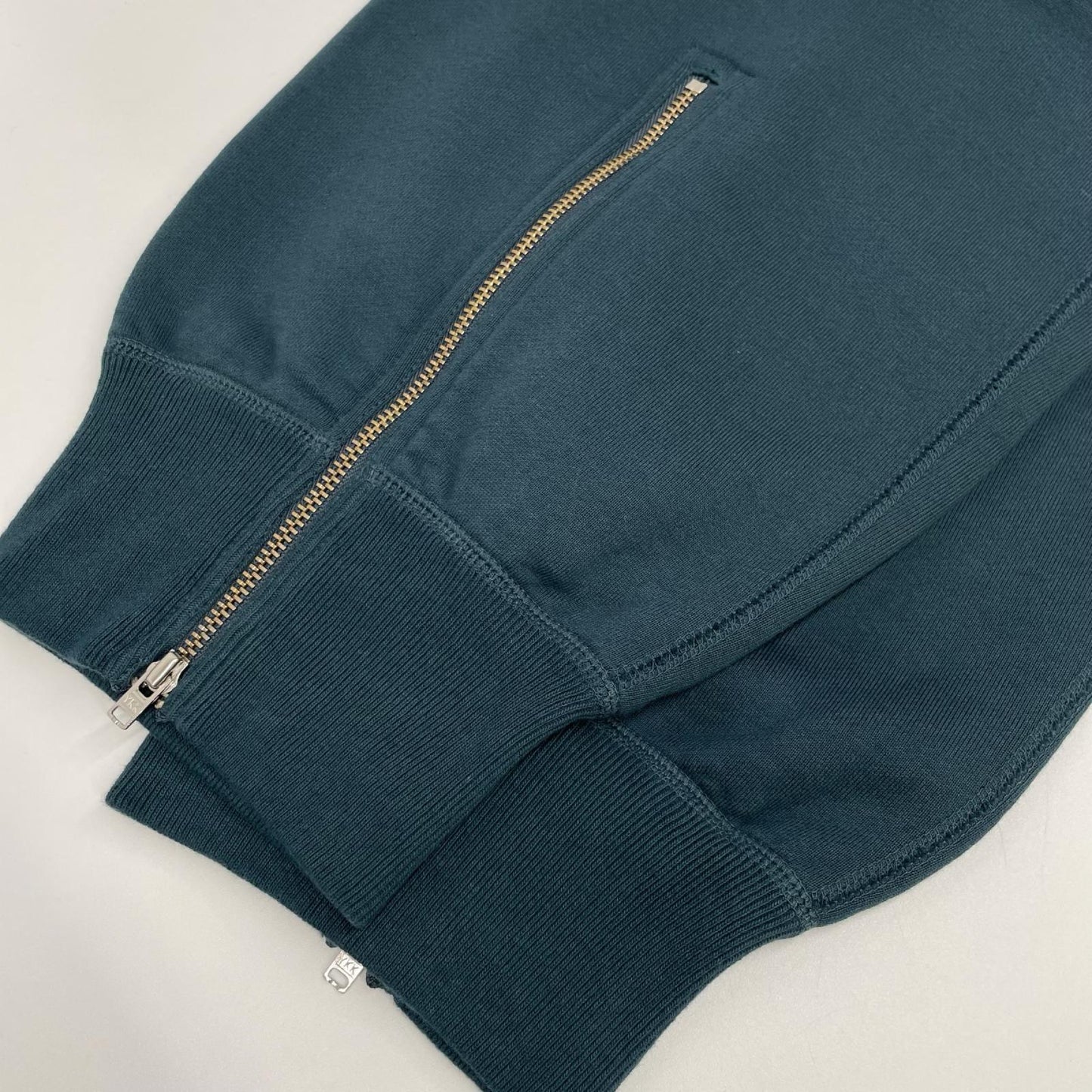 pelleq ペレック SS1003-AW22 ブルー コットン100 ジップ付き スウェットパンツ ボトムス