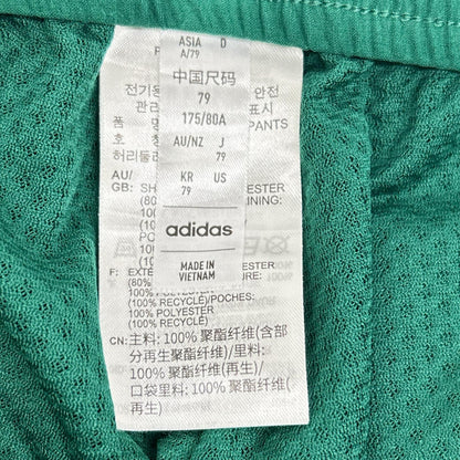 adidas アディダス 24年製 グリーン ツイストウィーブ EX-Stretch アーカイブ トラックジョガーパンツ ボトムス