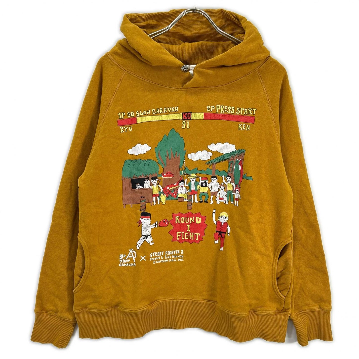 GO SLOW CARAVAN ゴースローキャラバン 【×STREET FIGHTER2】イエロー プリント フーデッドプルオーバー トップス