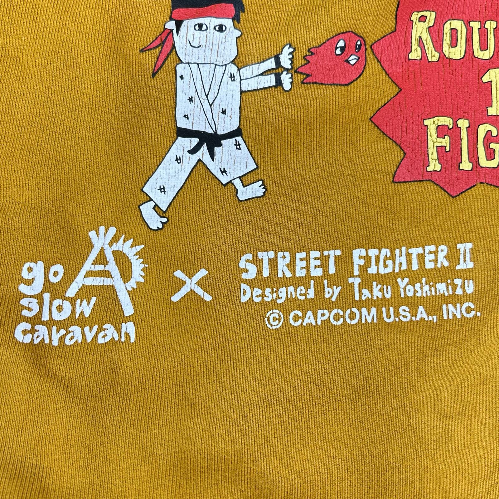 GO SLOW CARAVAN ゴースローキャラバン 【×STREET FIGHTER2】イエロー プリント フーデッドプルオーバー トップス