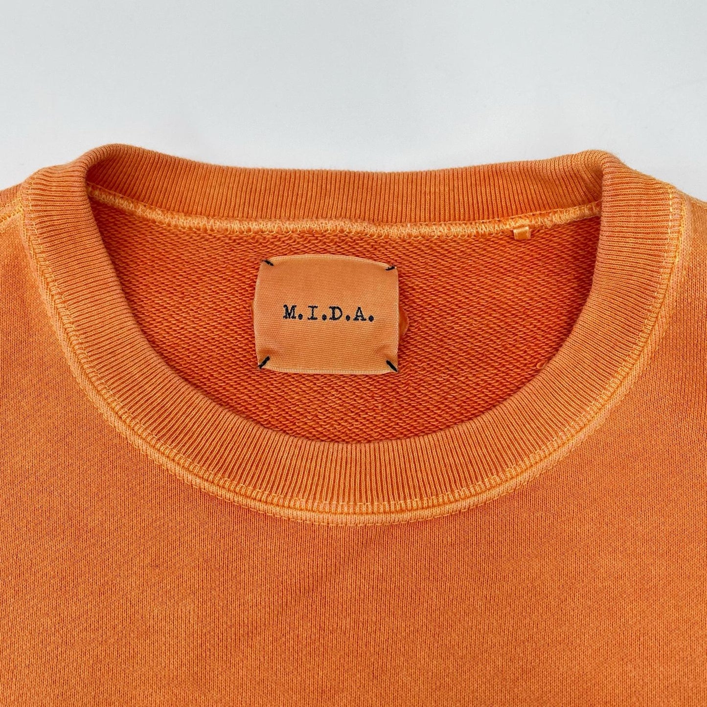 M.I.D.A. M.I.D.A. orange pigment-dyed sweatshirt tops