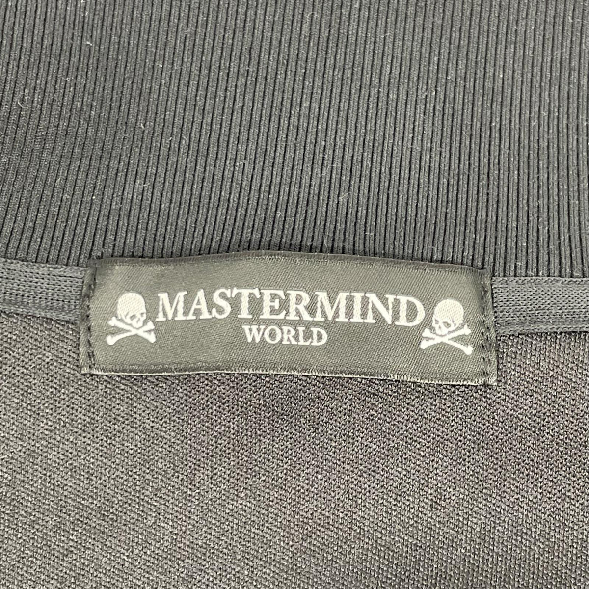 mastermind マスターマインド ×UMBRO ブラック バックロゴプリント トラックジャケット ジャケット