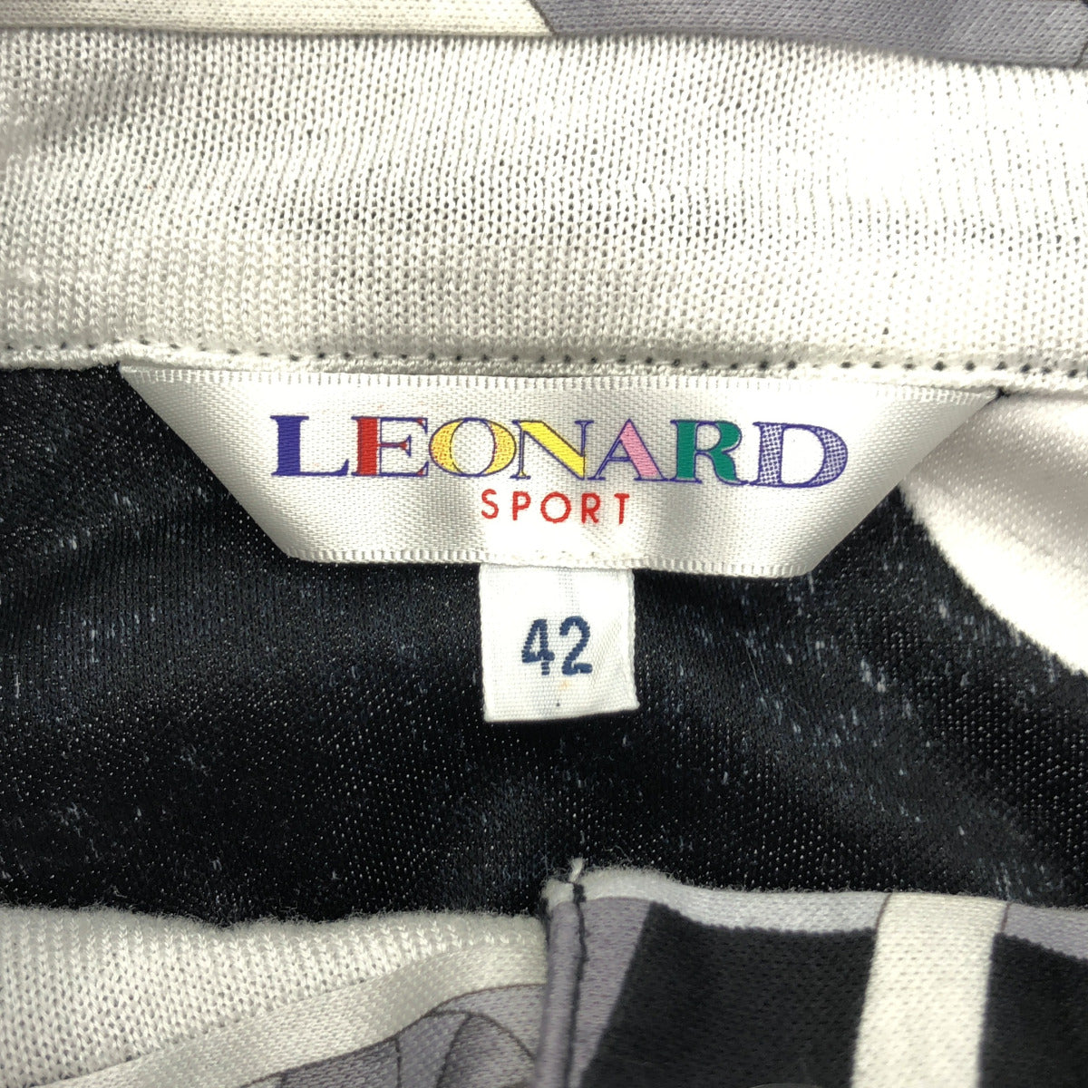 LEONARDSPORT レオナールスポーツ 0538008 ブラック×マルチカラー スタンドカラー ハーフボタン 半袖トップス トップス