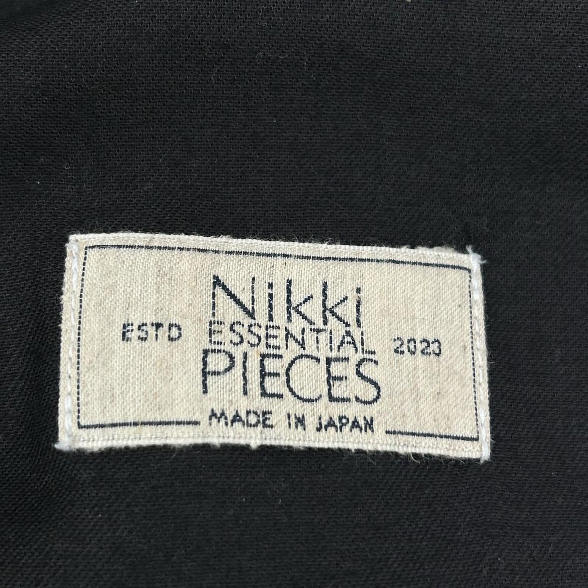 NIKKI ESSENTIAL PIECES ニッキエッセンシャルピーシーズ グレー チョークストライプ 2tuck Wide Tapered Trousers ボトムス
