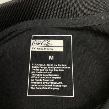 F.C.Real Bristol エフシーリアルブリストル FCRB-260153 ×Coca-Cola ブラック ウィーブストライプポロシャツ トップス