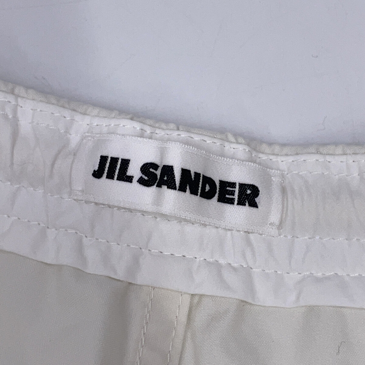 JILSANDER ジルサンダー J21KA0147 24SS ホワイト コットン ニーレングスプリーツ パンツ ボトムス