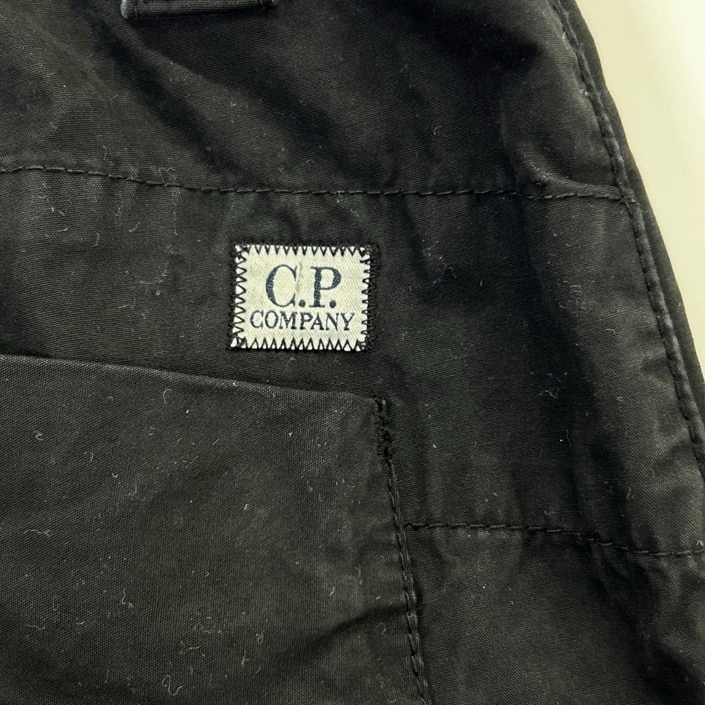 C.P.COMPANY シーピーカンパニー 19CMPA066A　25AW ブラック CARGO PT IN MICROPEPS PEACHED ボトムス