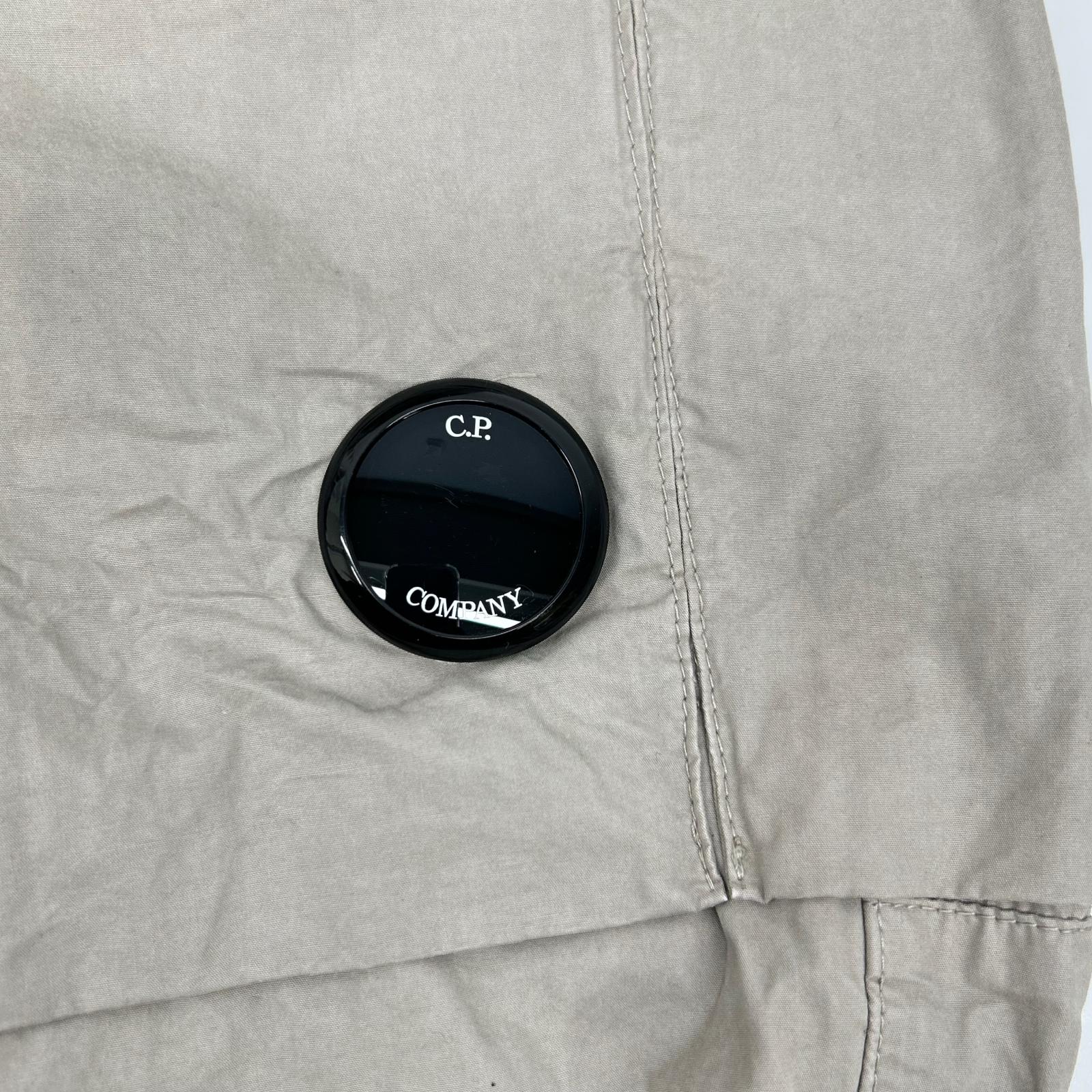 C.P.COMPANY シーピーカンパニー 19CMPA066A ベージュ CARGO PT IN MICROPEPS PEACHED ボトムス