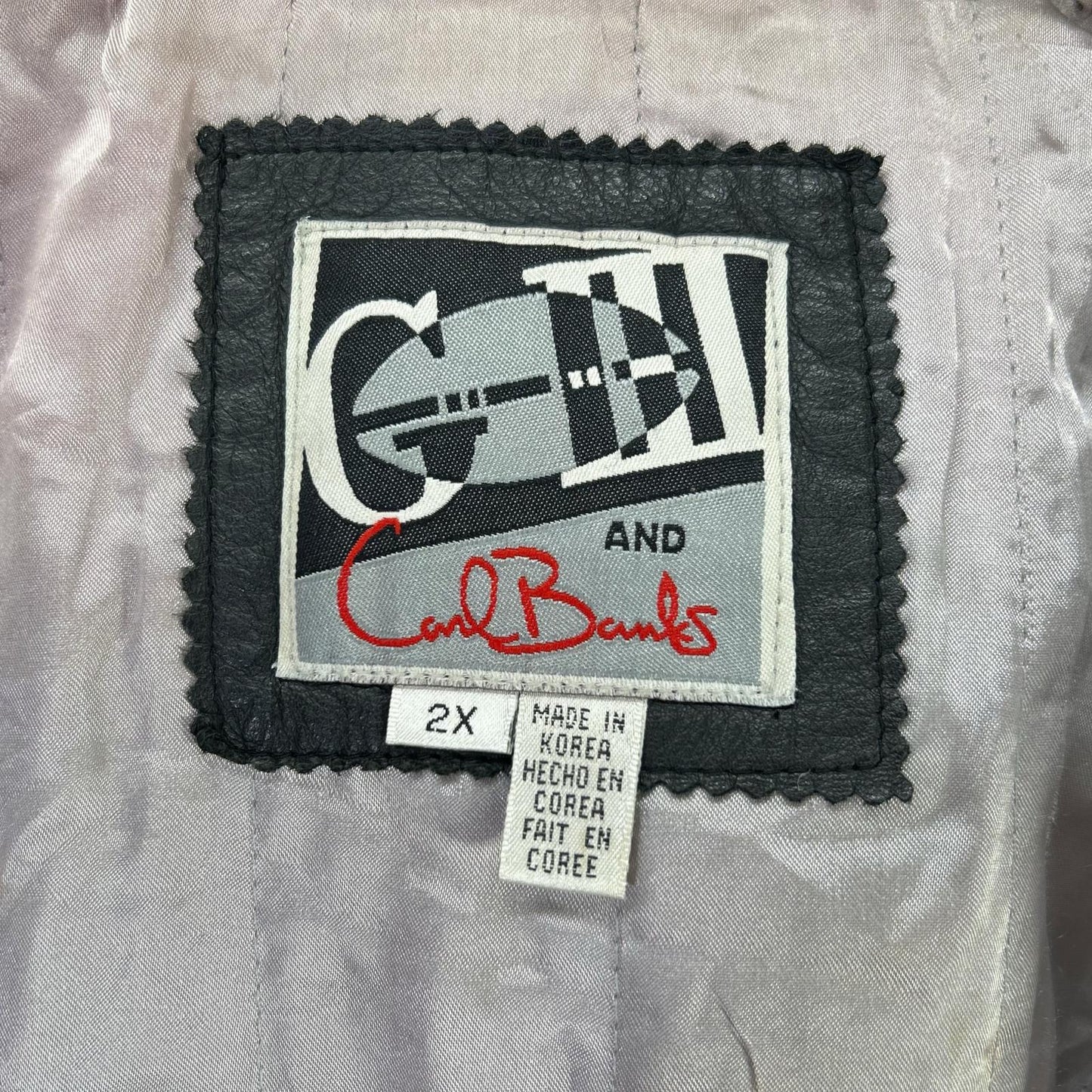G-III SPORTS ジースリースポーツ ブラック×ホワイト レザー RAIDERS フーディージャケット ジャケット