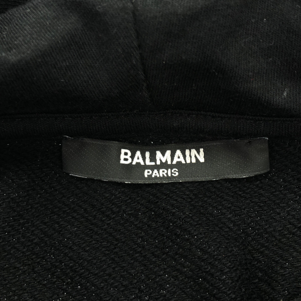 BALMAIN Balmain Black Embossed-Logo Pullover Hoodie Top