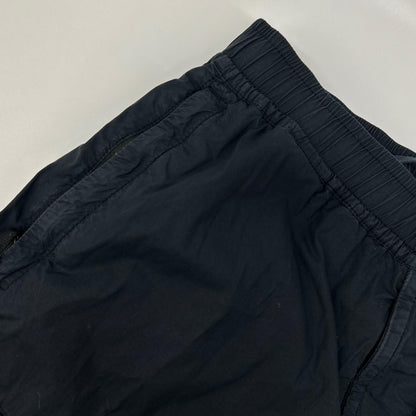 STONE ISLAND ストーンアイランド ネイビー ロゴパッチ付き テーパードカーゴパンツ ボトムス