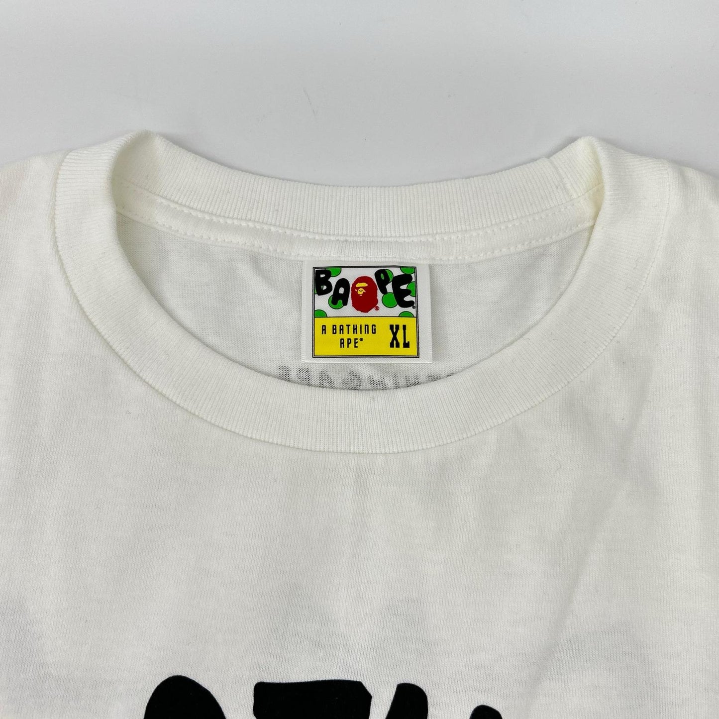 A BATHING APE アベイシングエイプ ホワイト キースヘリング COLLEGE Tシャツ トップス