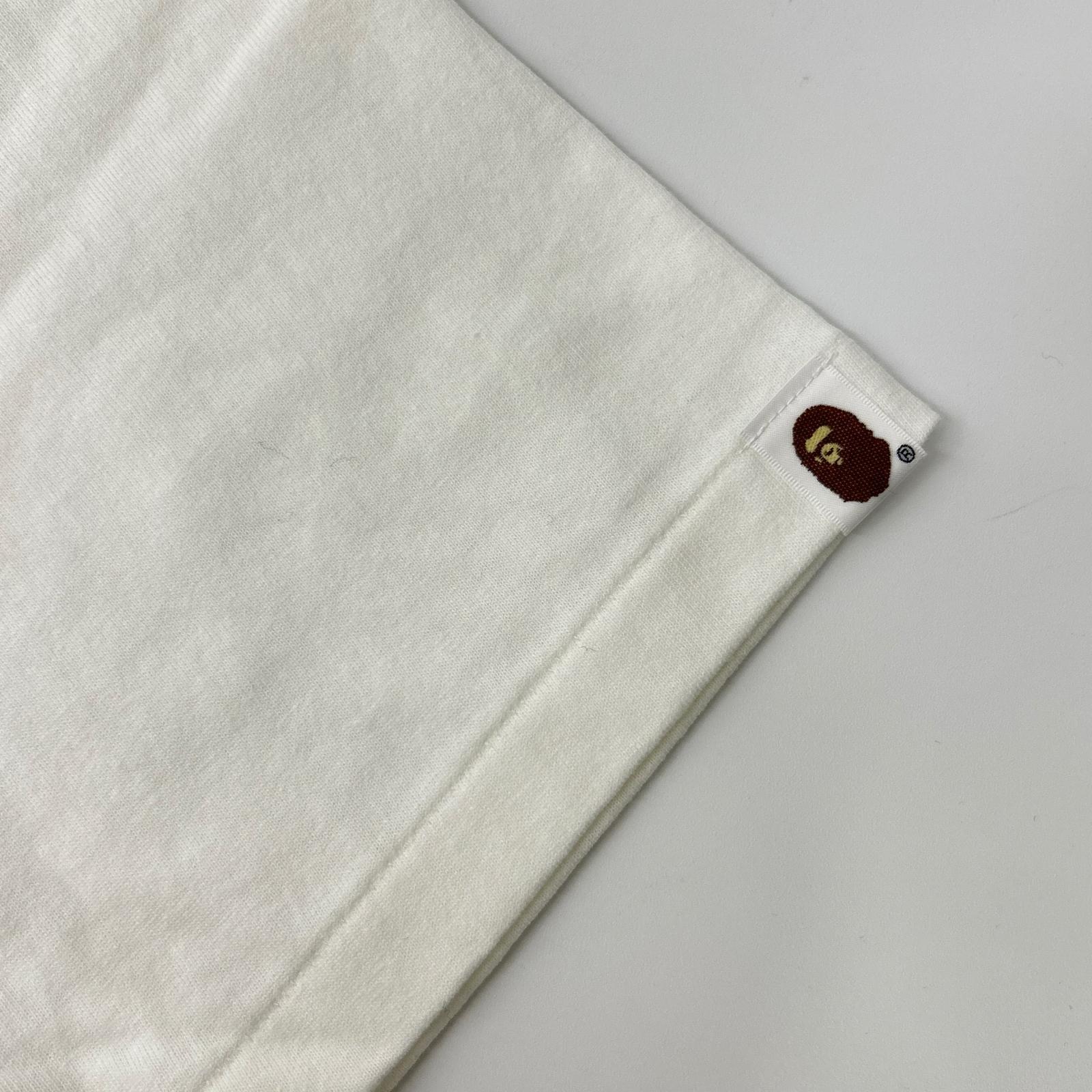 A BATHING APE アベイシングエイプ ホワイト キースヘリング COLLEGE Tシャツ トップス