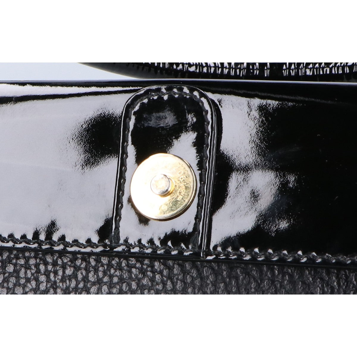 GIANNI VERSACE GIANNI VERSACE Sunburst leather/patent leather handbag
