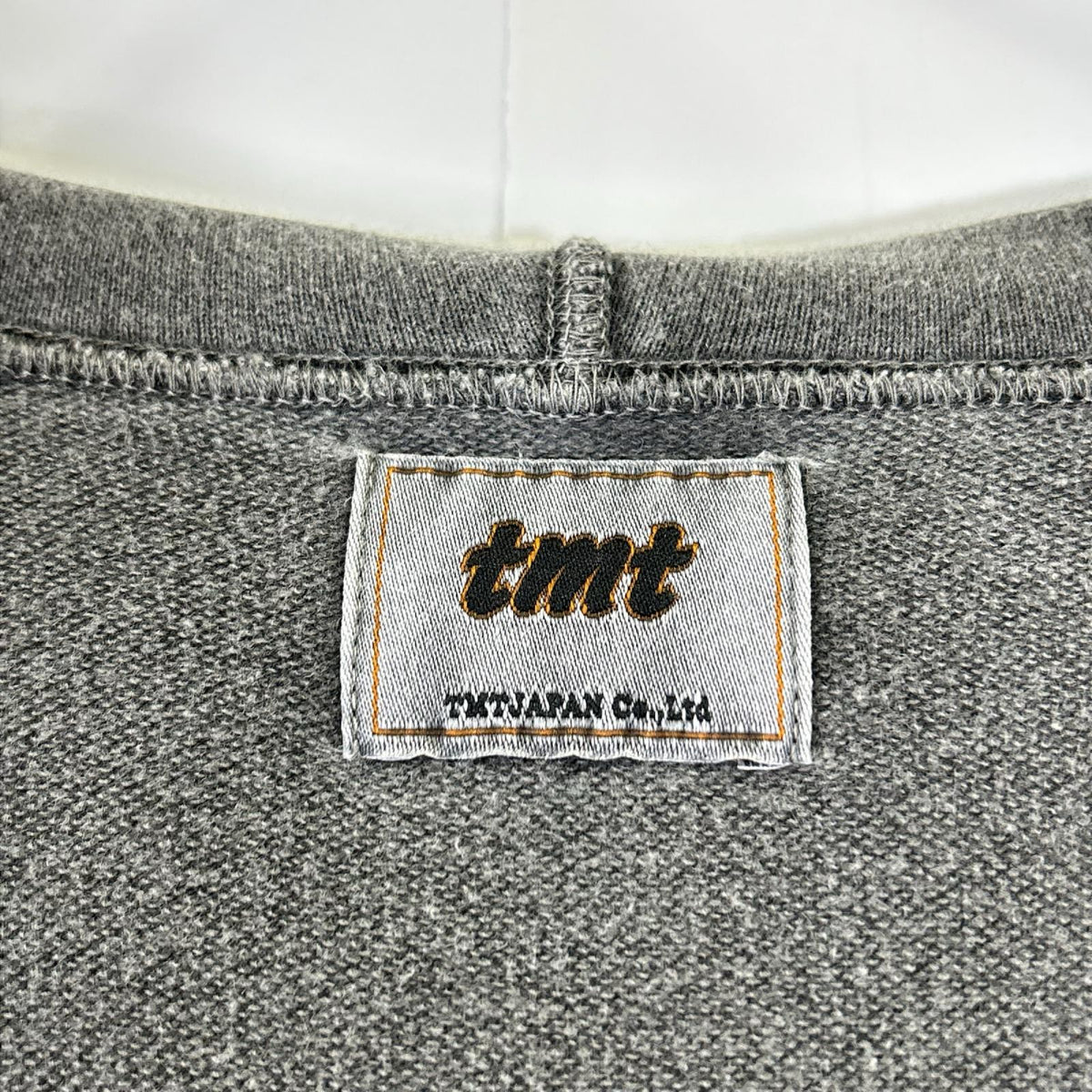 TMT ティーエムティー グレー ワッペンデザイン ジップアップパーカ ジャケット