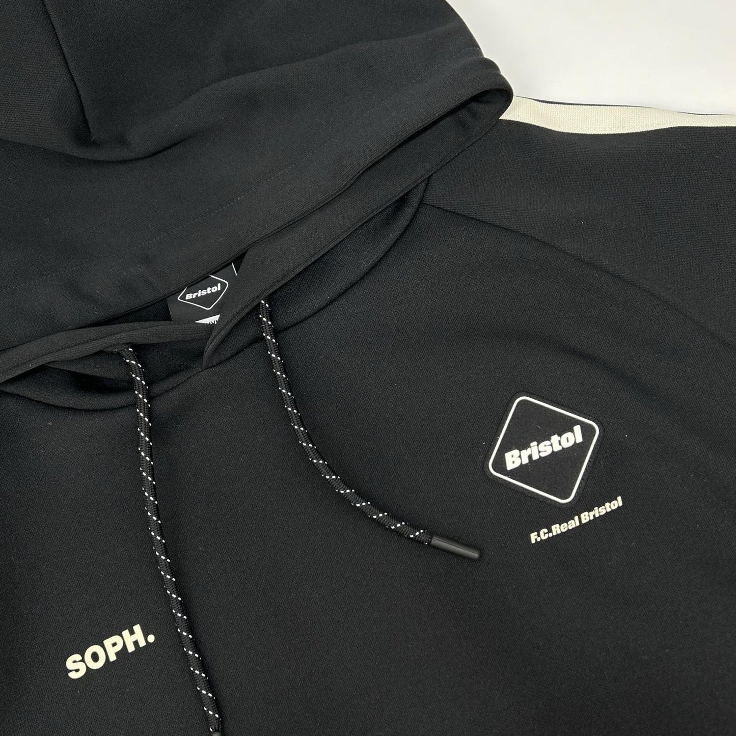 F.C.Real Bristol エフシーリアルブリストル 25年 FCRB-252082 ブラック TRAINING TRACK HOODIE トップス
