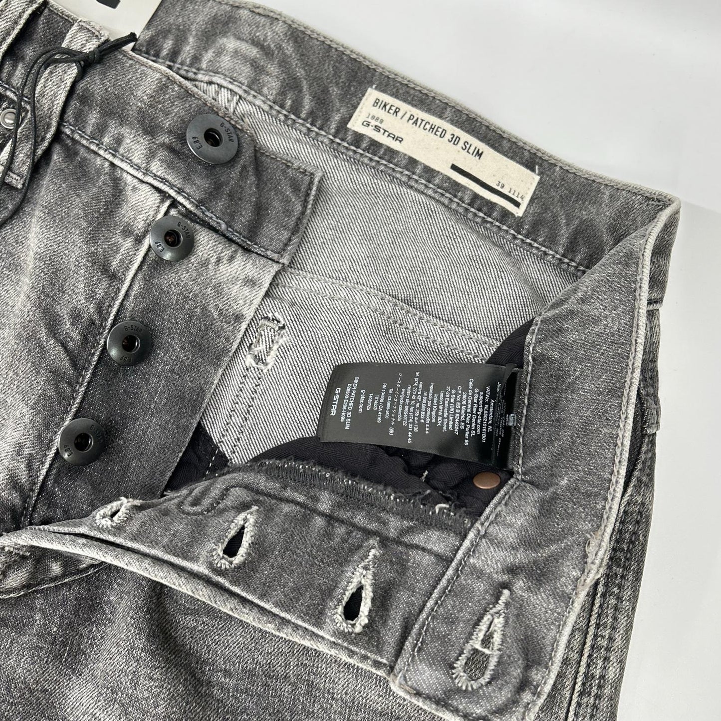 G-STAR RAW ジースターロゥ D28500-E206-H095 61 体裁断バイカーディテールスリムテーパードジーンズ ボトムス