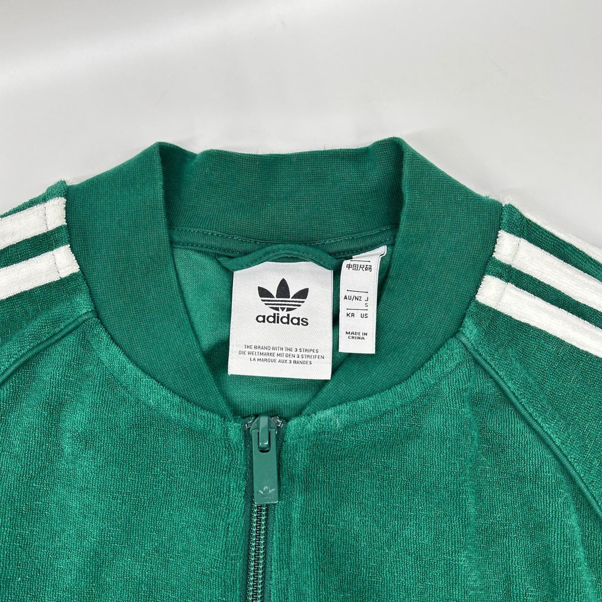 adidas アディダス グリーン JX8973 SST テリートラックトップ トップス