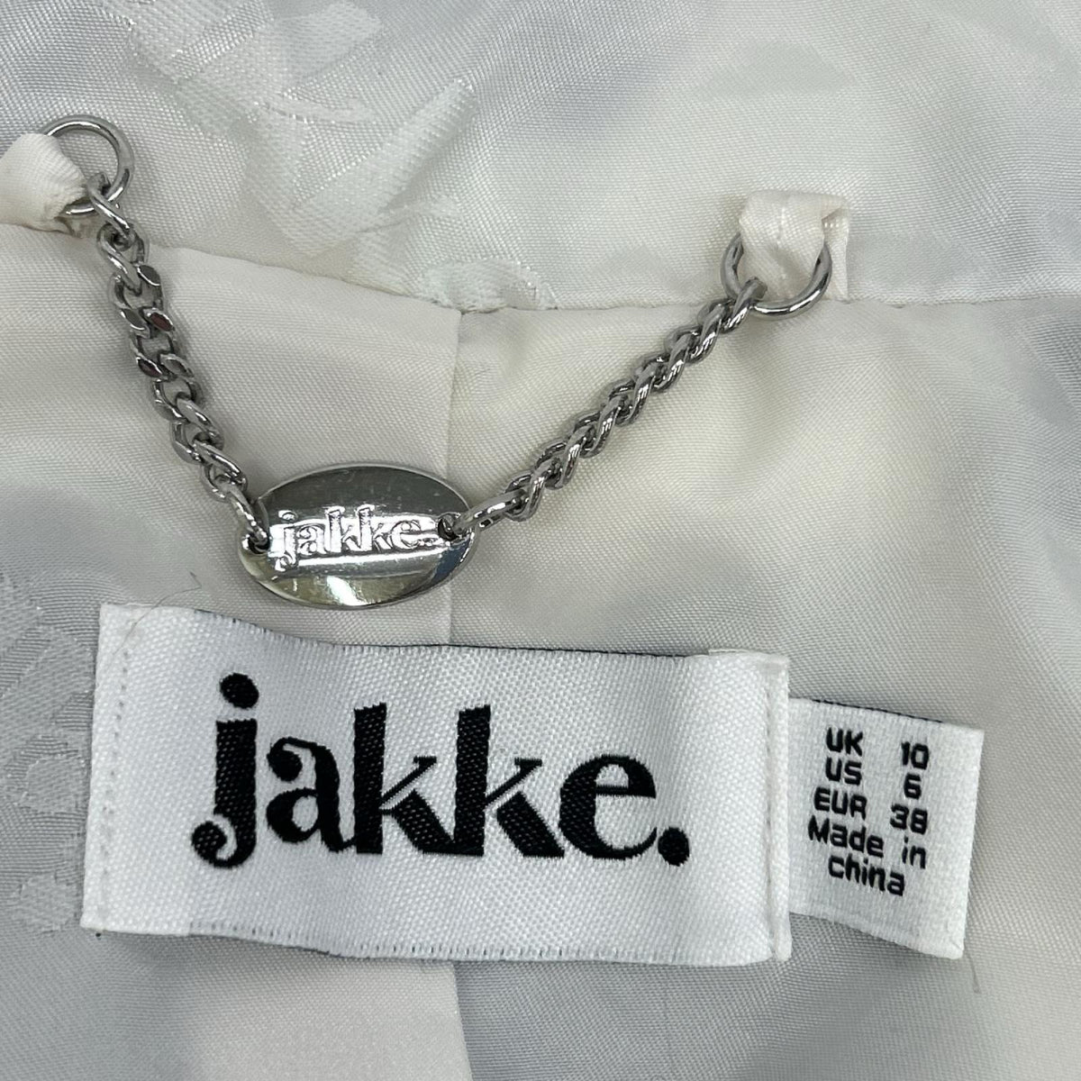 JAKKE ジャッキー エコファー 牛柄 フーディージャケット ジャケット
