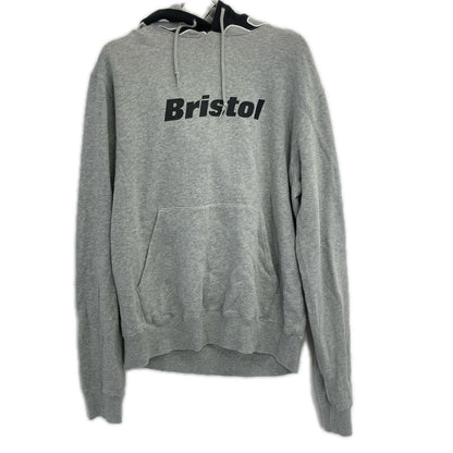 F.C.Real Bristol エフシーリアルブリストル FCRB-190053 グレー ファイヤーパターン ロゴ フーディープルオーバー トップス