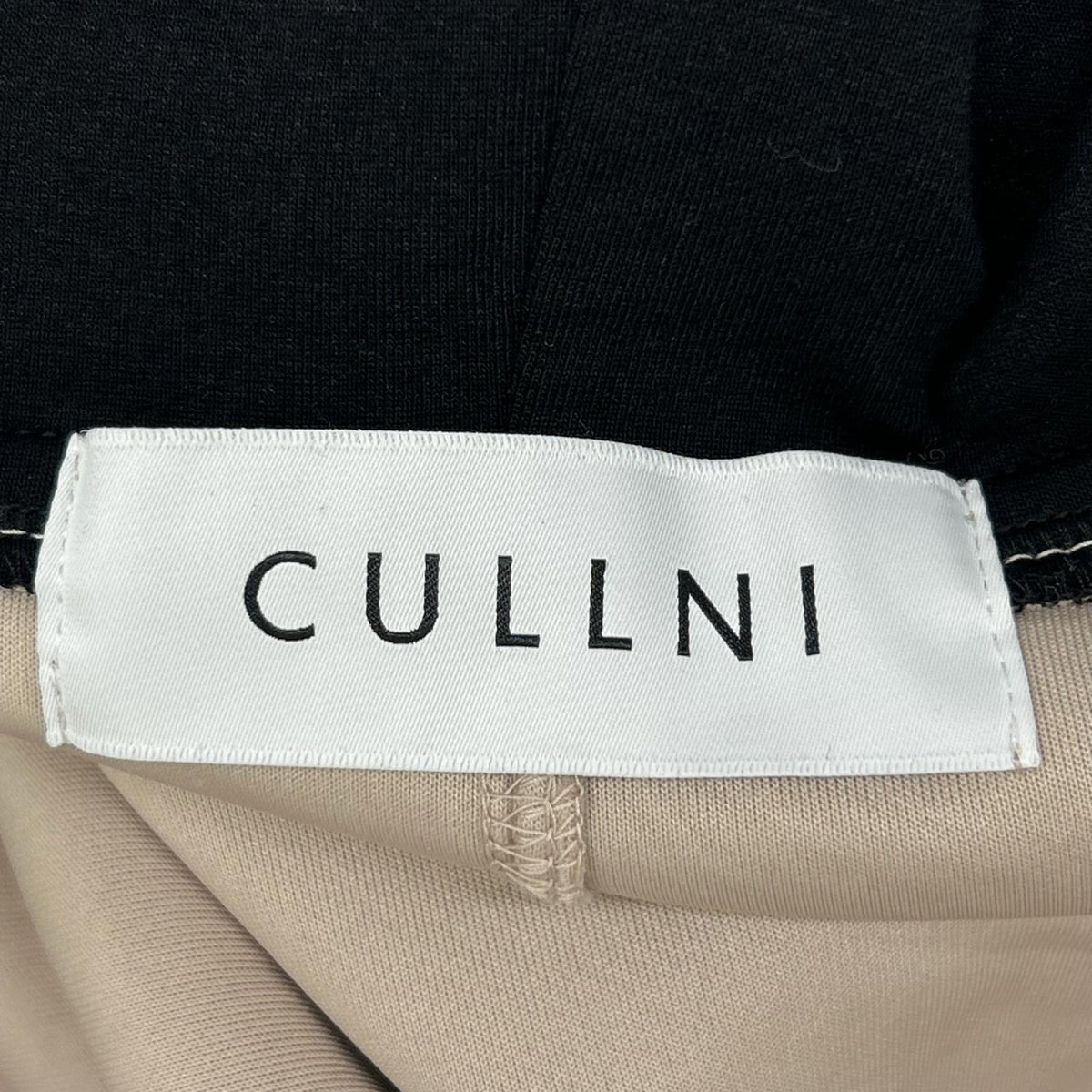 CULLNI クルニ 21AW 015 ベージュ アシンメトリージップアップパーカー トップス