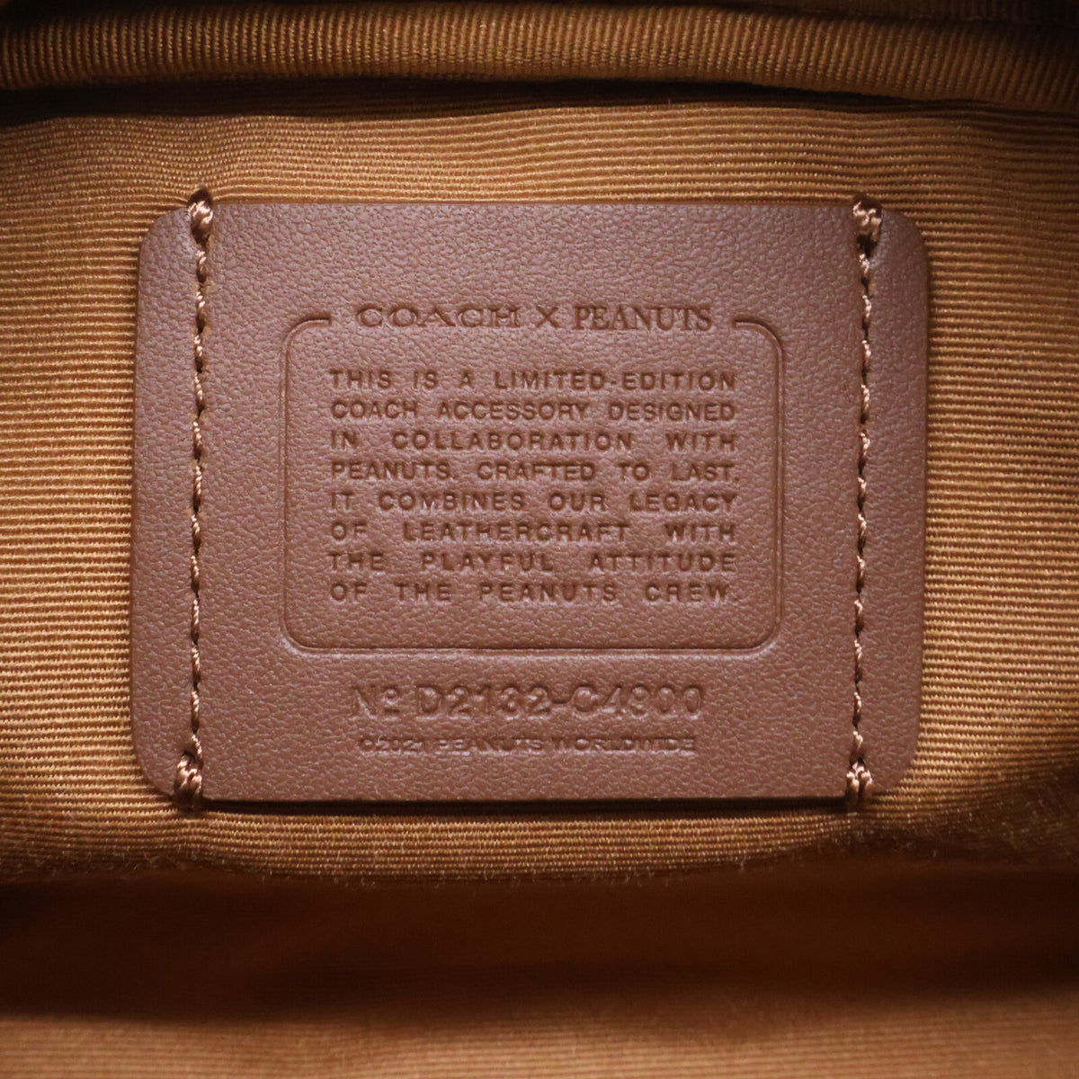 COACH コーチ ｘPEANUTS D2132 レザー ラウンドジップ ポーチ
