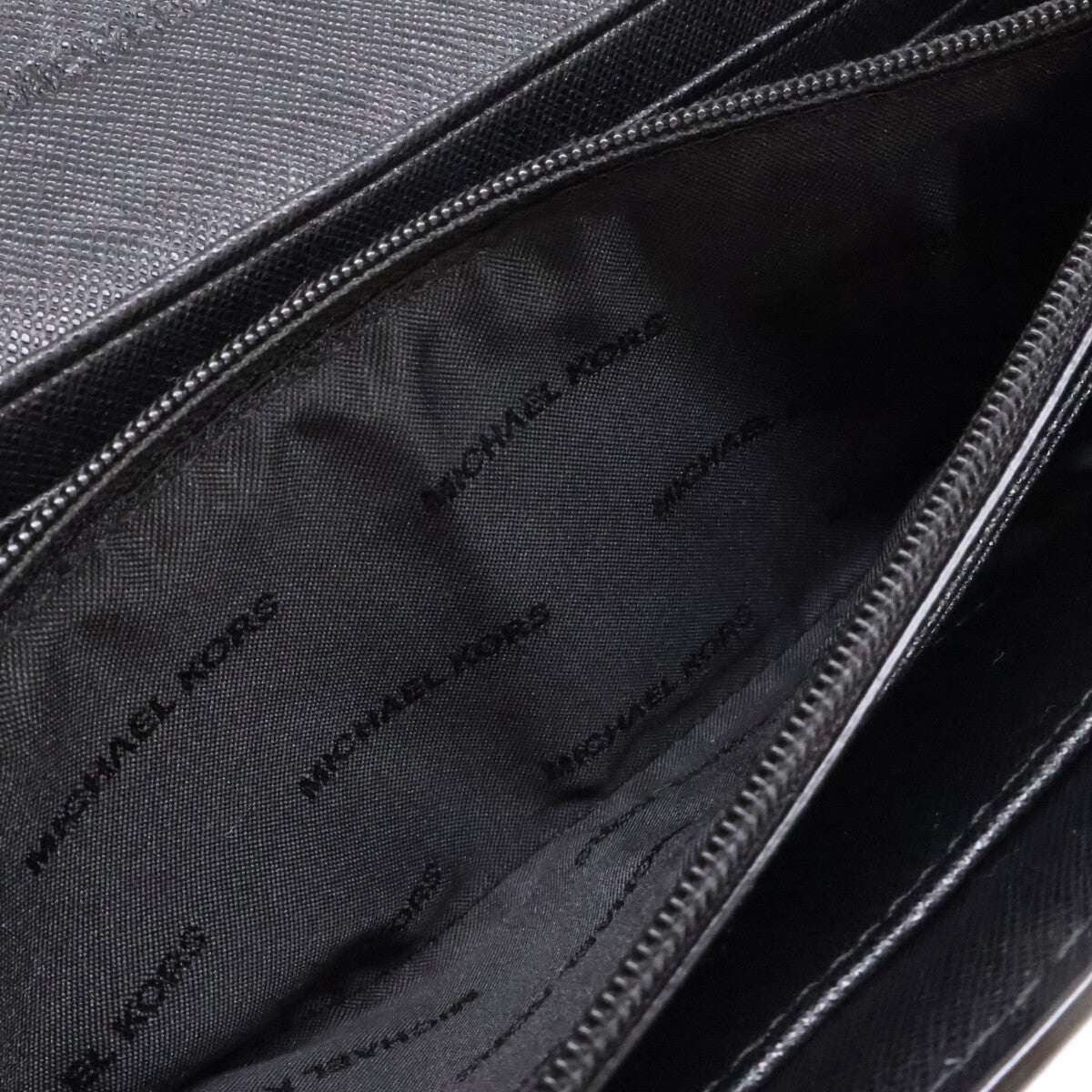MICHAEL KORS マイケルコース サフィアーノレザー フラワーモチーフカットアウト ロングウォレット 長財布（小銭入れあり）