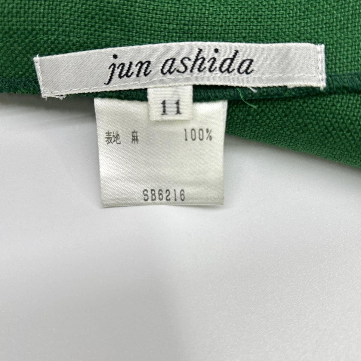 JUN ASHIDA green linen half-sleeve jacket with decorative gold buttons, jacket