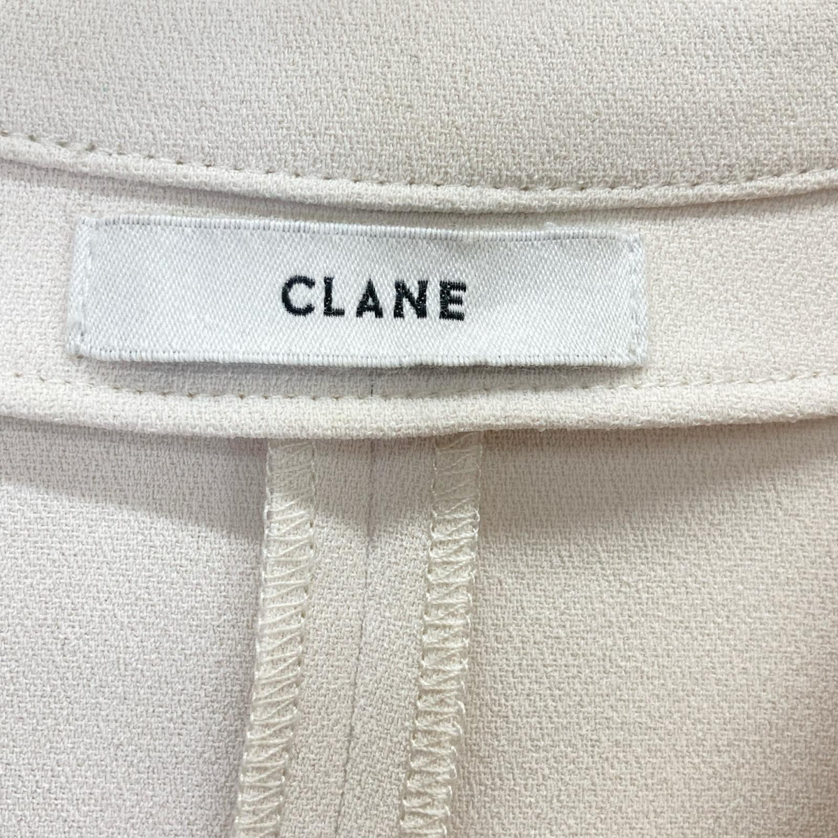CLANE Ivory 14122-4032 Half-Zip Flared Top