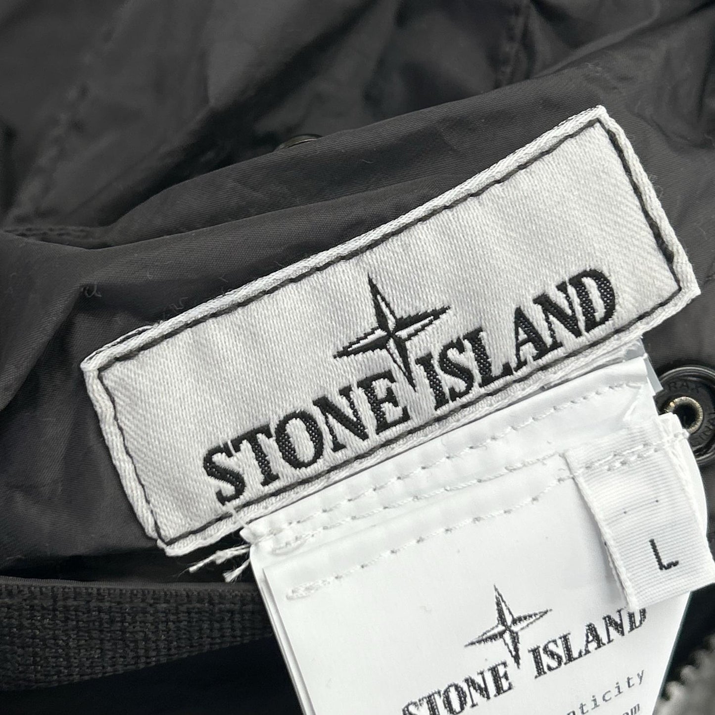 STONE ISLAND ストーンアイランド K1S155100008S00A5 Compass badge ﾘﾊﾞｰｼﾌﾞﾙｶｰﾃﾞｨｶﾞﾝ トップス L