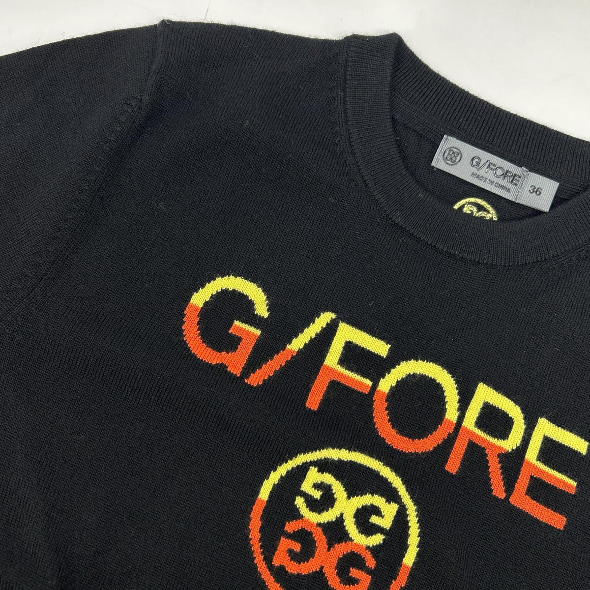 G/FORE ジーフォア 073214757 black logo-embroidered knit top
