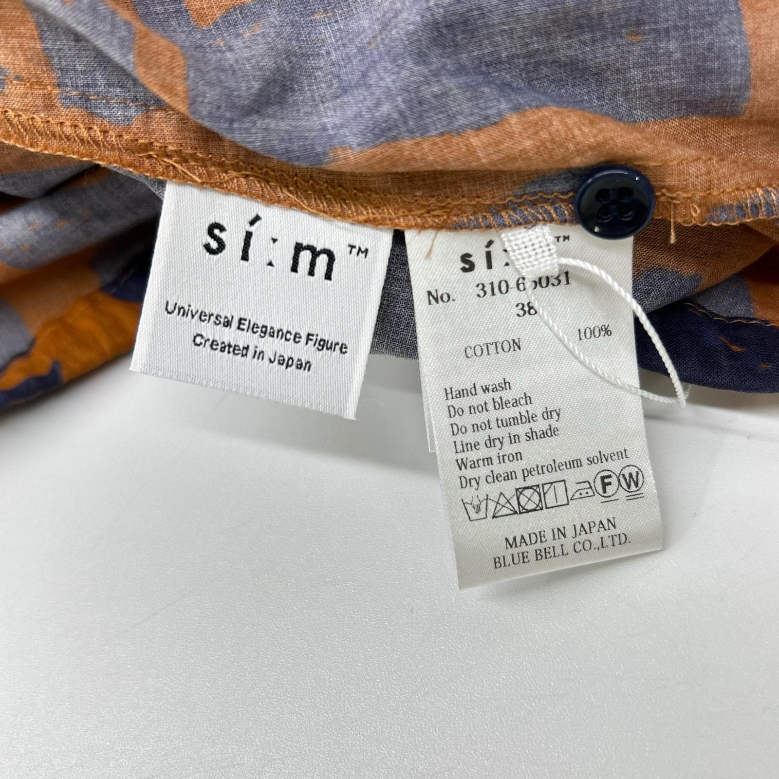 si:m スィーム 310-65031 オレンジ×ネイビー柄デザイン フリルブラウス トップス