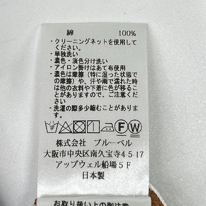 si:m スィーム 310-65031 オレンジ×ネイビー柄デザイン フリルブラウス トップス