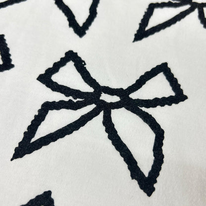 COMMEdesGARCONS COMMEdesGARCONS コムデギャルソンコムデギャルソン（コムコム） ホワイト リボン柄 Tシャツ トップス