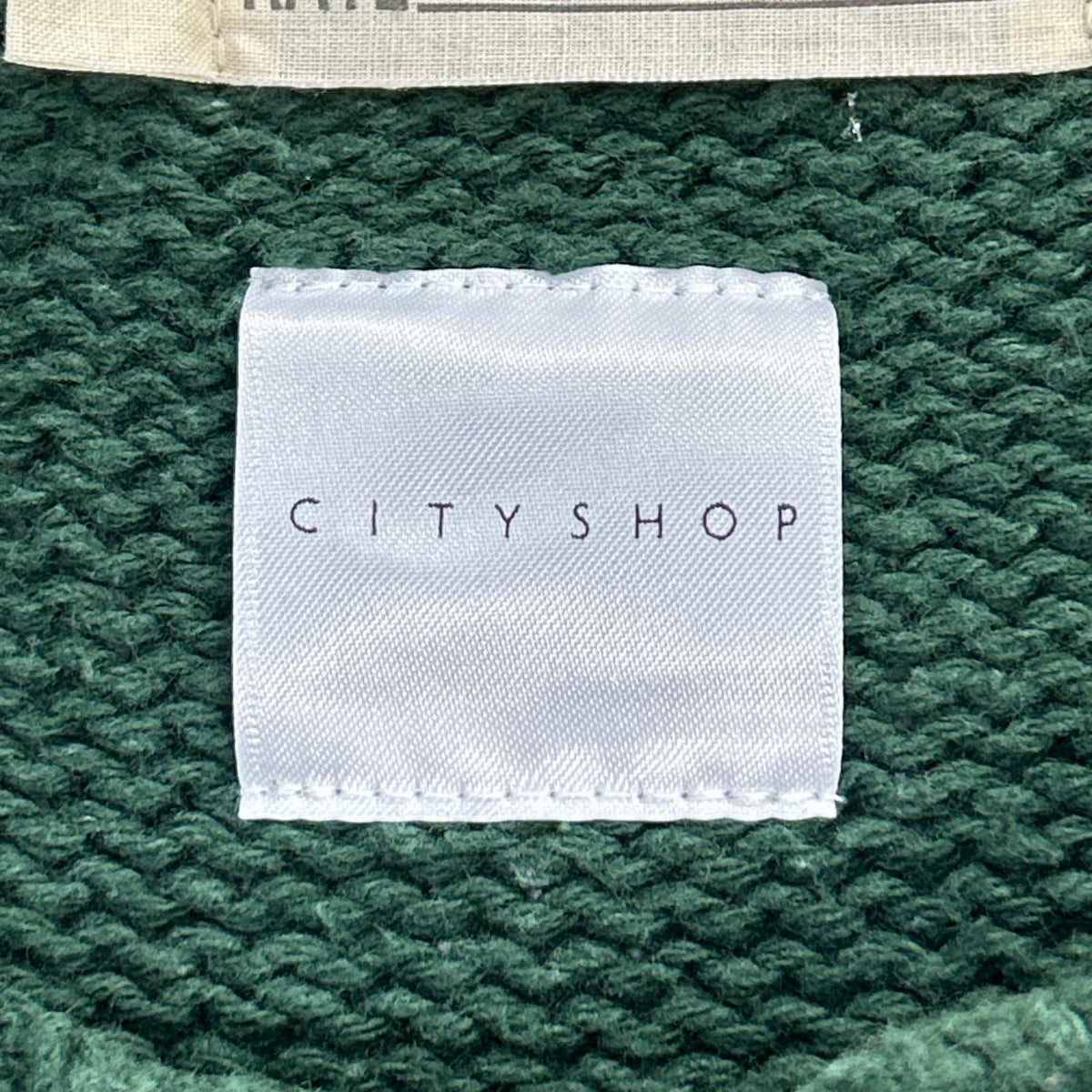 77circa ナナナナサーカ CITYSHOP カーキ サイドジップアップコットンニット トップス