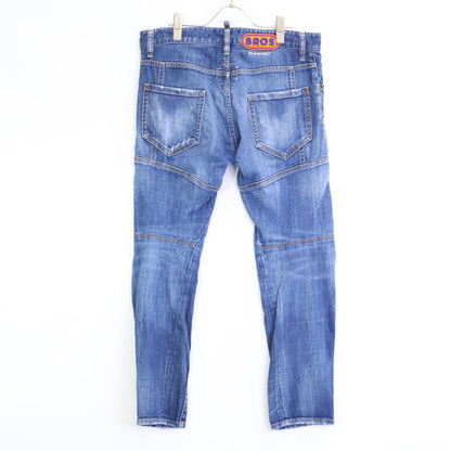 DSQUARED2 ディースクエアード S74LB0873 MEDIUM WASH 4 TIDY BIKER JEANS ﾌﾞﾙｰ ﾀﾞﾒｰｼﾞ加工 ﾎﾞﾀﾝﾌﾗｲﾃﾞﾆﾑﾊﾟﾝﾂ ボトムス 46 メンズ