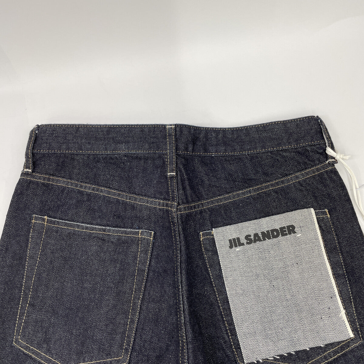 JIL SANDER+ JPPR663102 Indigo Cotton Button Fly Twist Denim Pants Bottoms