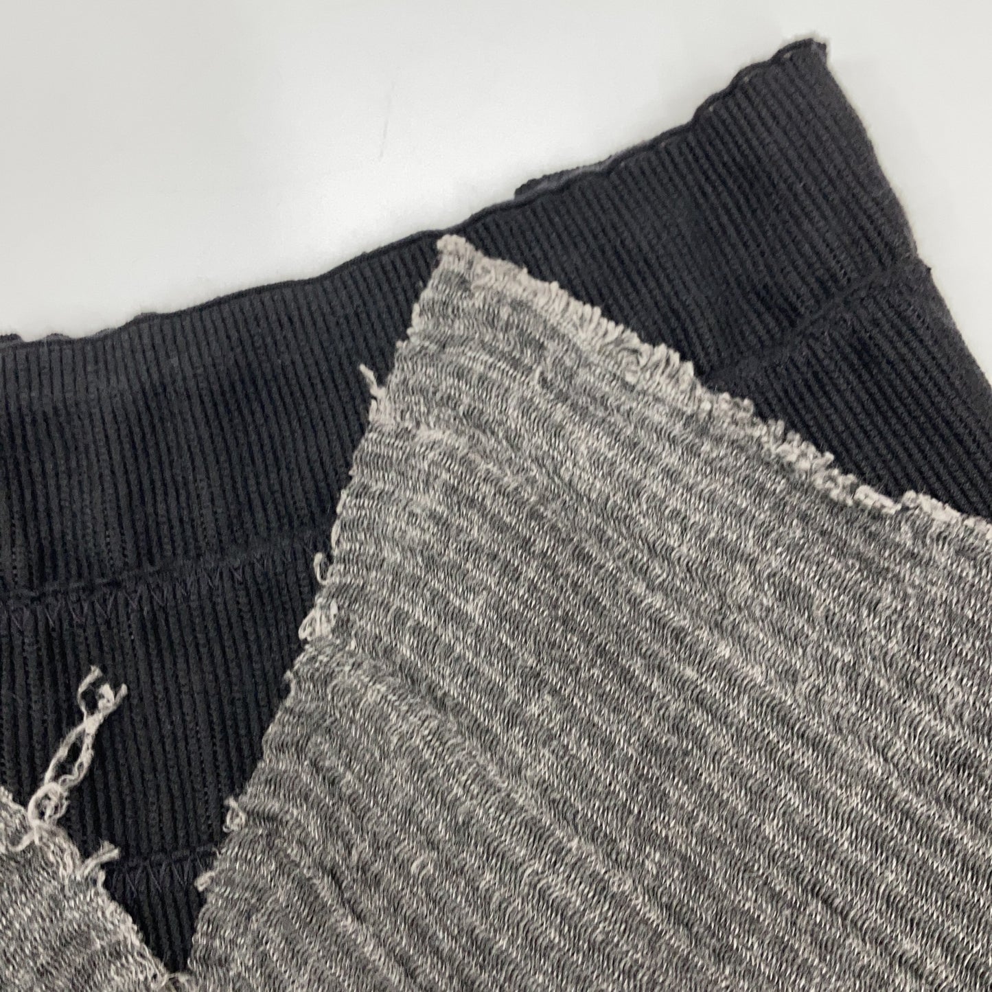 m.a+ Grey x Black Docking Cut-Off Skirt