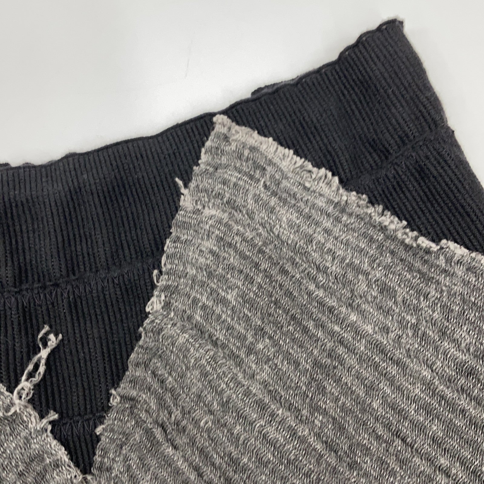 m.a+ Grey x Black Docking Cut-Off Skirt