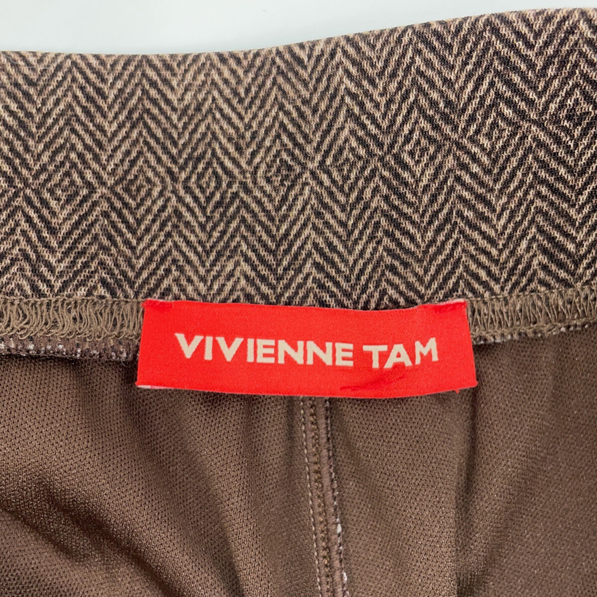 VIVIENNE TAM 2025 Brown Herringbone Net Pants Bottoms 38