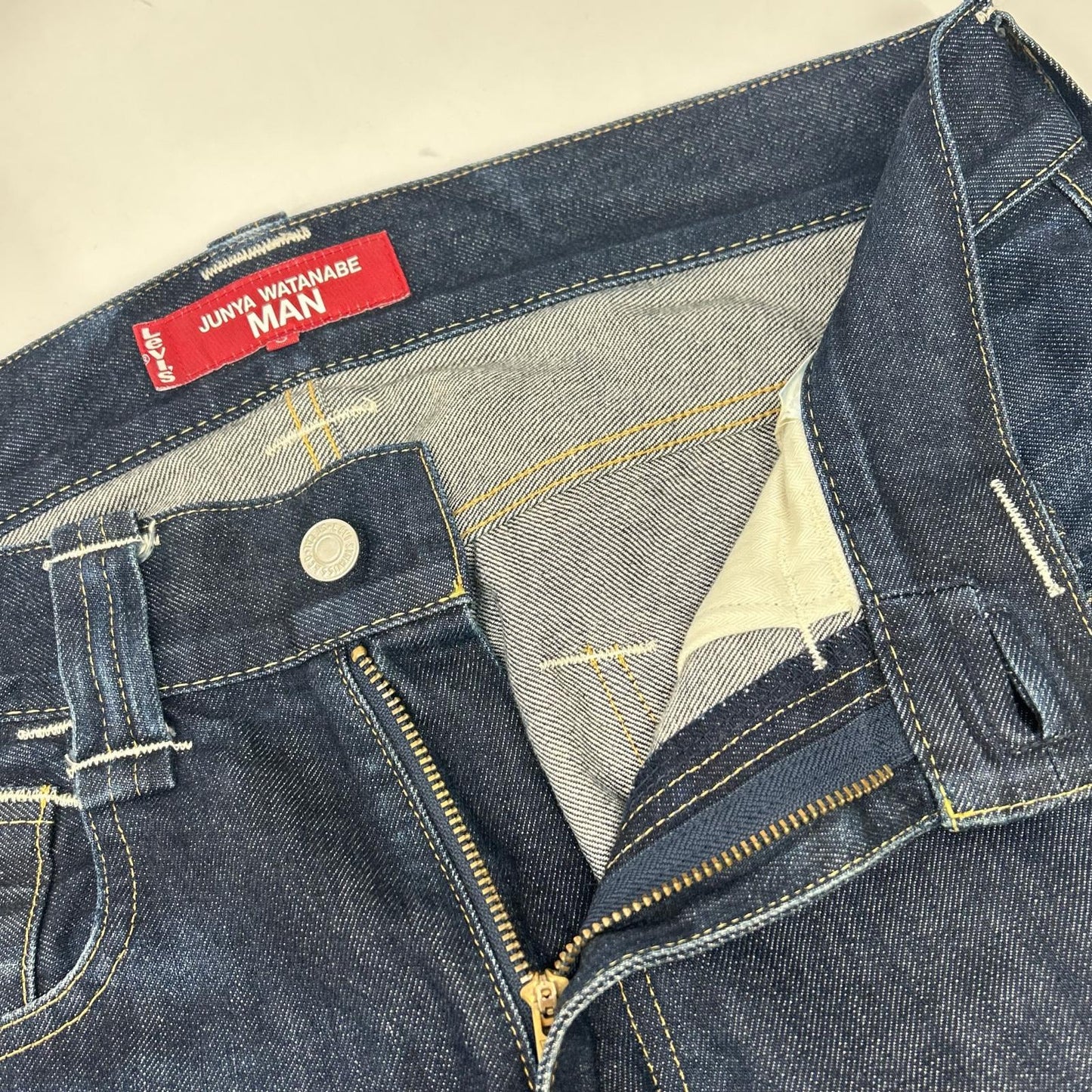 JUNYA WATANABE MAN 渡边淳弥男士 【×Levi's】WJ-P221 22AW 靛蓝色棉质牛仔布联名长裤 下装