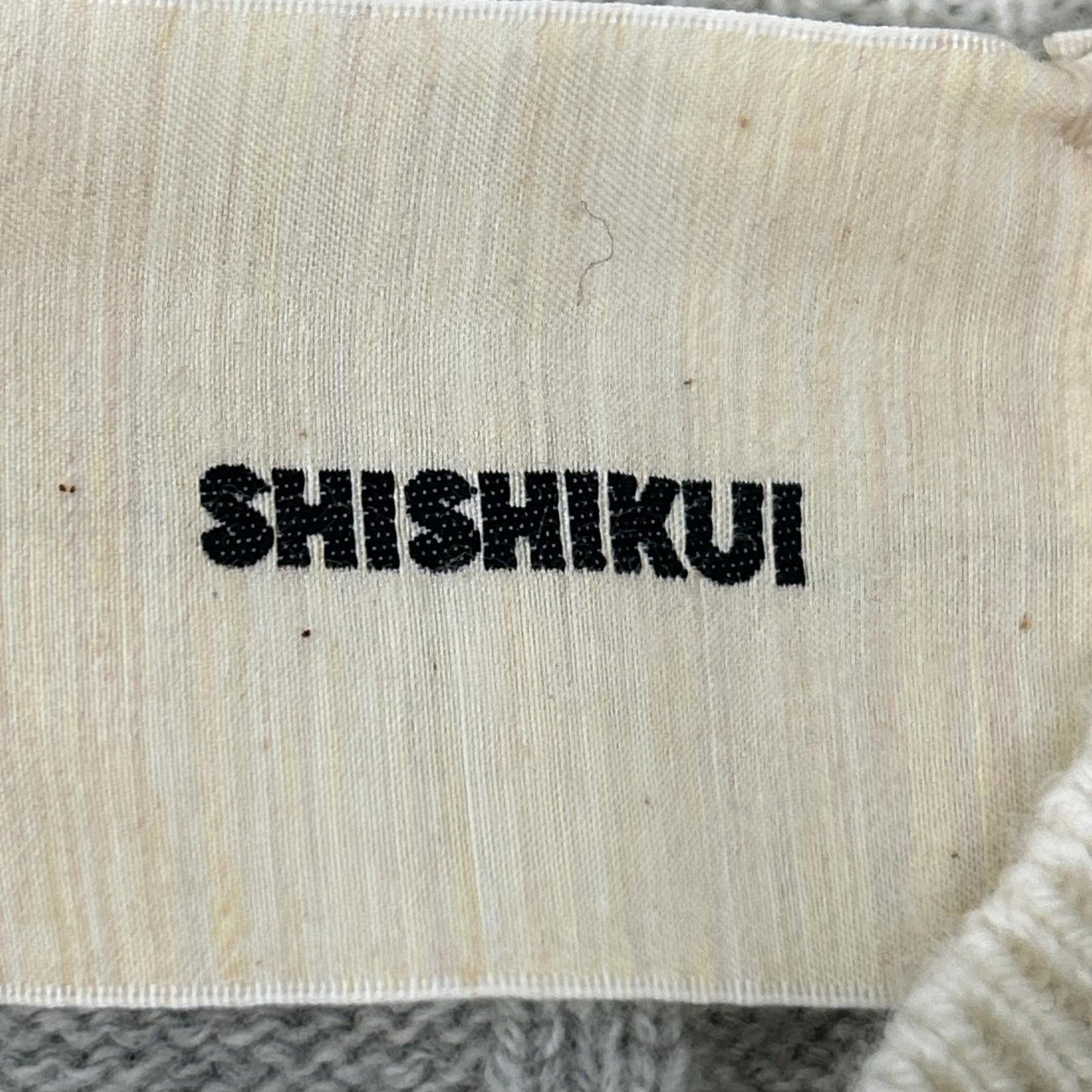 THE SHISHIKUI Shishikui Wool Urami Long Sleeve Button Cardigan Top