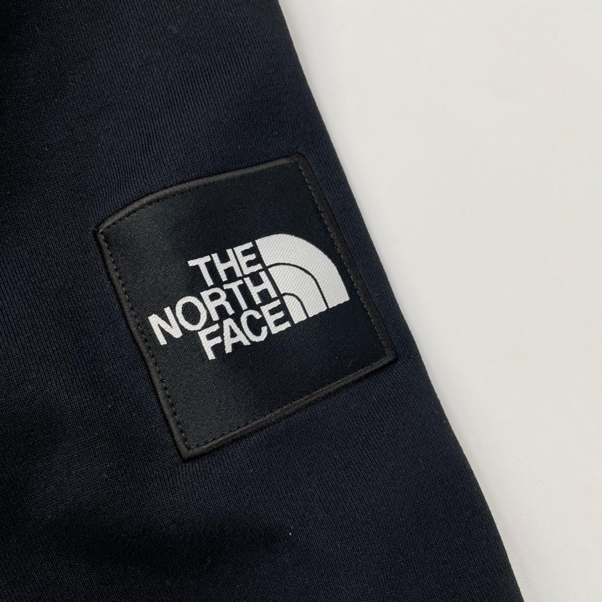 THE NORTH FACE ノースフェイス NT12035 ブラック スクエアロゴフーディ パーカー トップス
