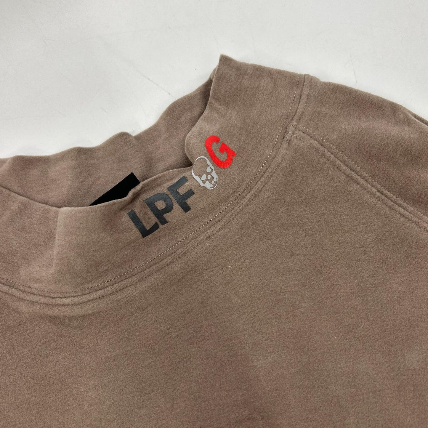 1piu1uguale3 ウノピゥウノウグァーレトレ 【GOLF】GRT163-ARN027 ブラウン RAGLAN L/S UV INNER ラグランモックネックカットソー トップス