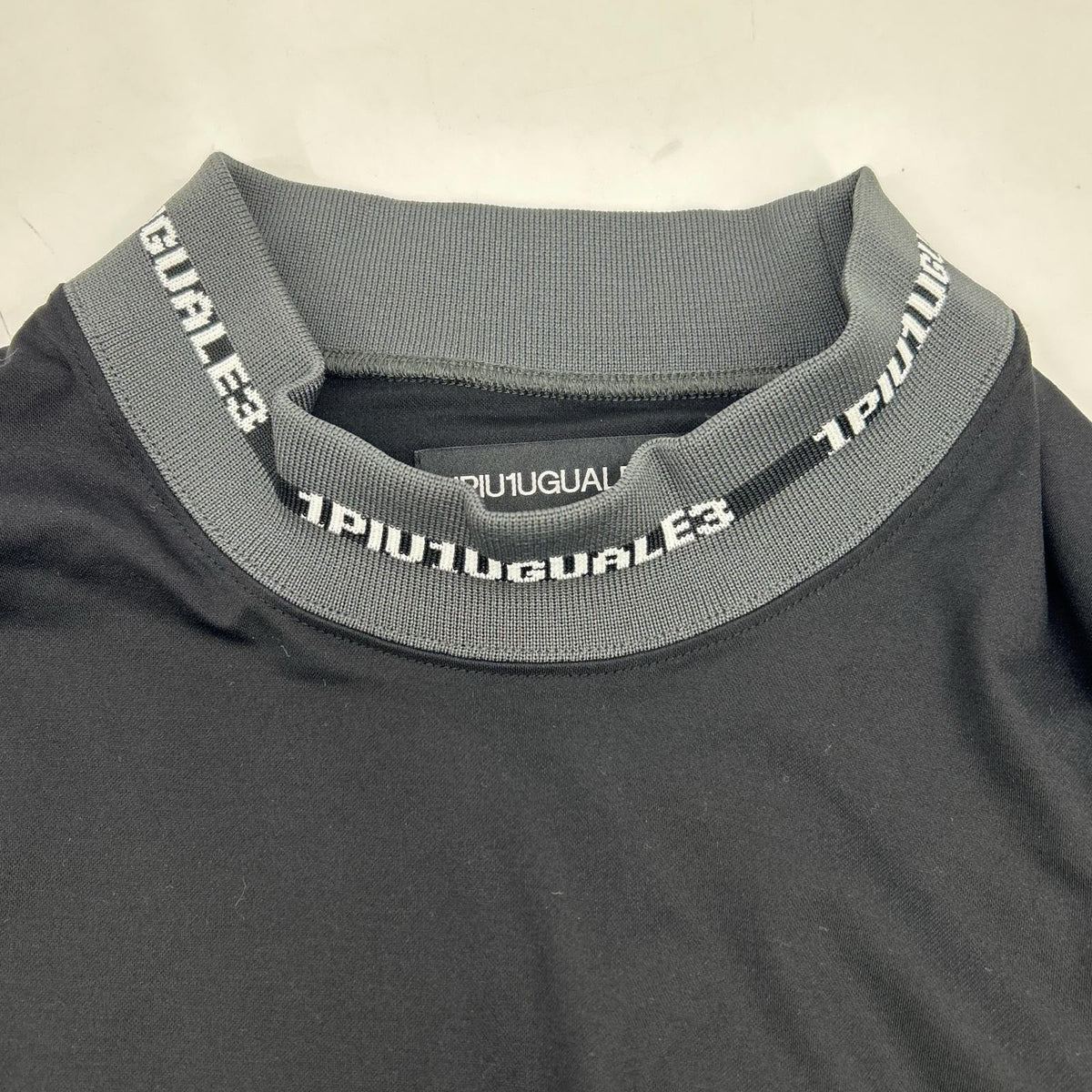 1piu1uguale3 ウノピゥウノウグァーレトレ 【SPORT】CM071-MT01 24AW ブラック COMFORTABLE HYBLID MOCK モックネックカットソー トップス
